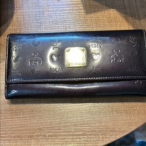 MCM Dark Plum Embossed Wallet with Gold Accent